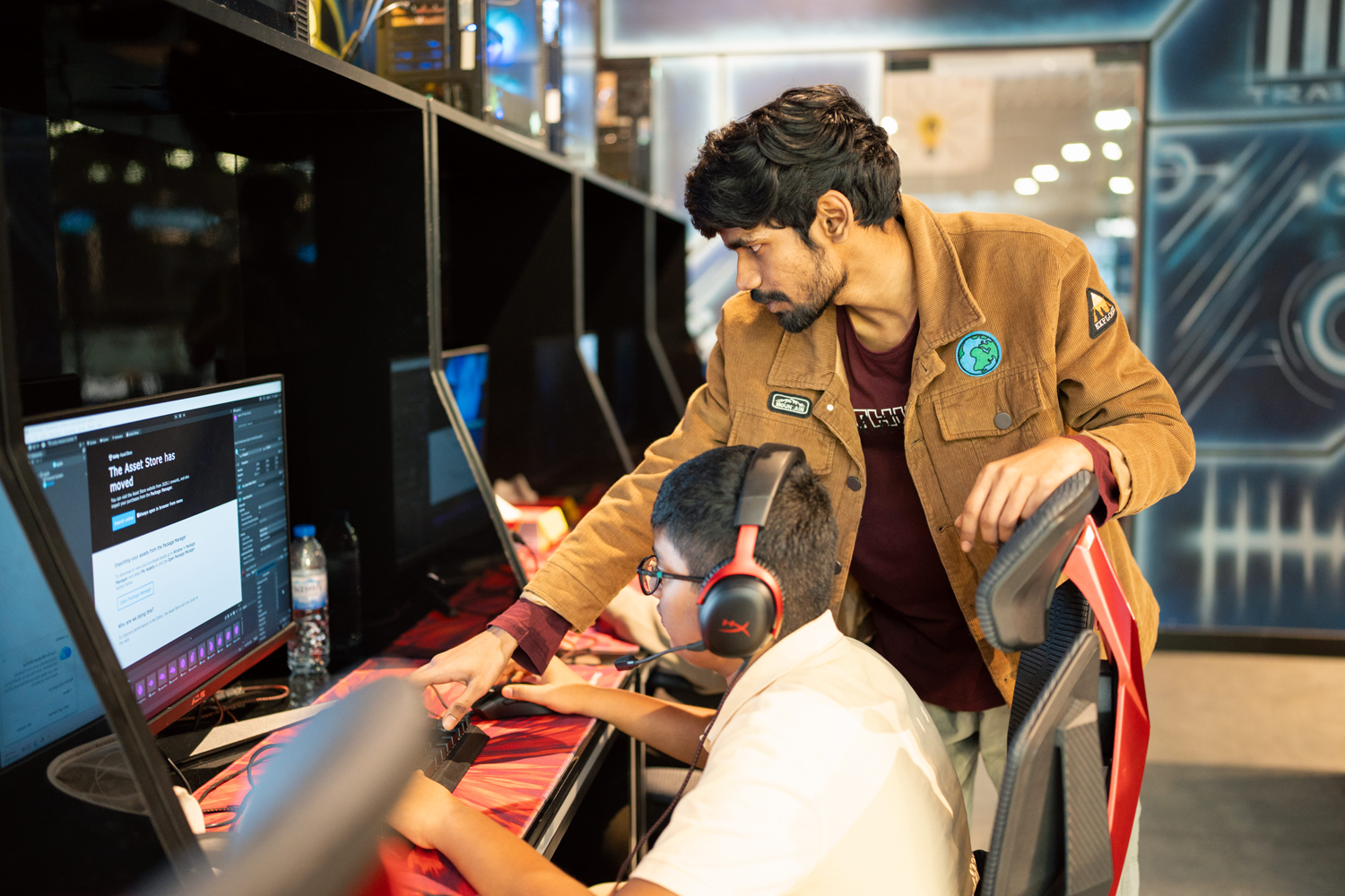 Students assembling a robotics project in a lab